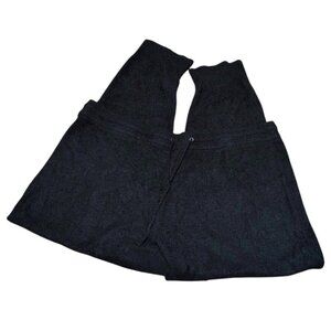 Knix Cozy Track Pants are black fleece joggers, perfect for lounging.
